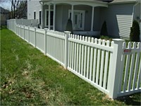 <b>White vinyl contemporary picket fence</b>